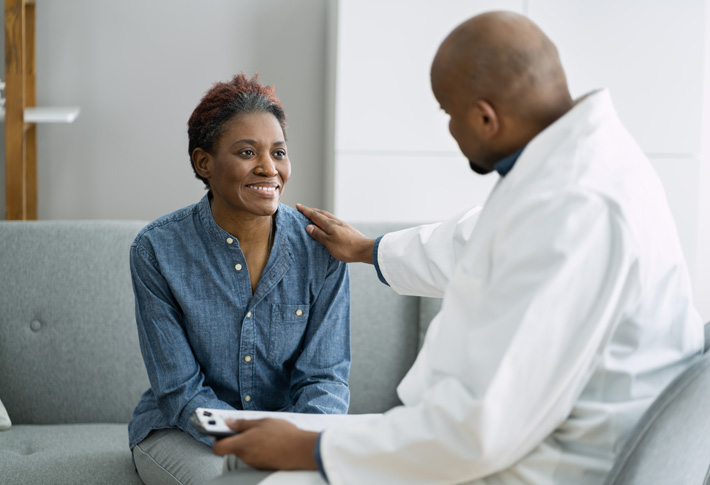 Doctor providing support during consultation